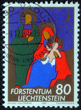 LIECHTENSTEIN - CIRCA 1981: A greeting Christmas stamp printed in Liechtenstein shows Holy Family