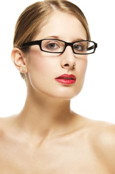 young beautiful woman with black glasses and red lips on white background