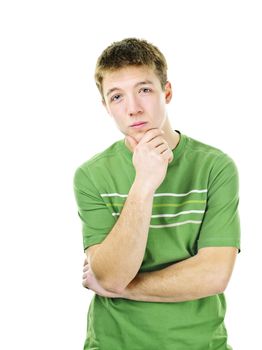 Thoughtful young man standing isolated on white background