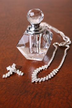 Glass bottle with a diamond jewelery set