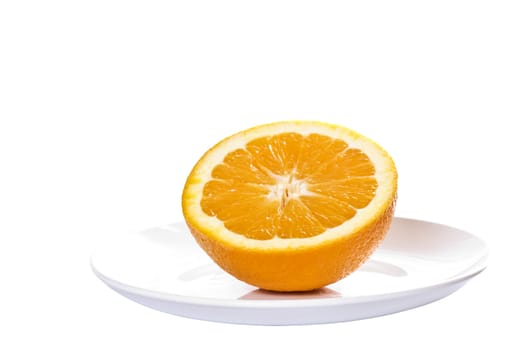 Orange half on a dish