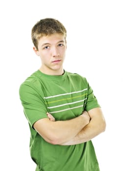 Serious young man standing with arms crossed isolated on white background