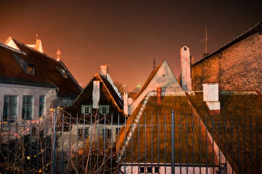 Scandinavian houses and roofs at night, Tallinn, Estonia