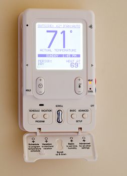 Electronic thermostat with blue LCD screen for controlling air conditioning and heating HVAC