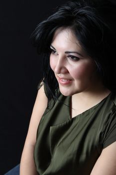 Stylish Native American woman against a dark background