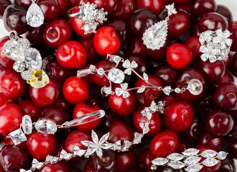 Jewels at fruit red ripe cherries berry background