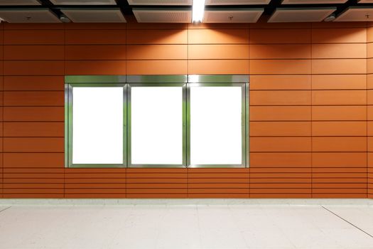 Blank billboard in metro station
