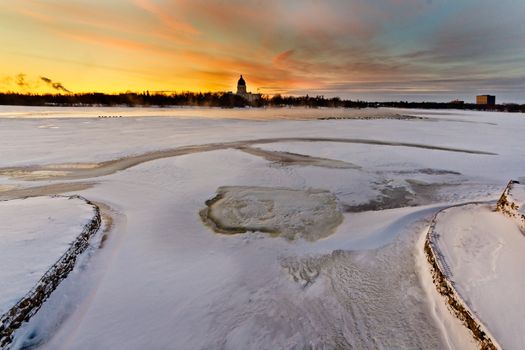 Wascana lake frozen on a cold November day during winter in Regina, Canada.