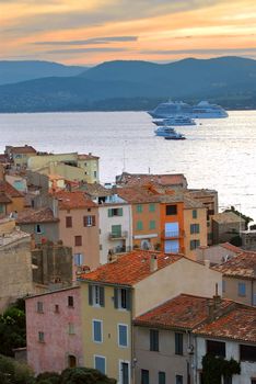 View at St.Tropez and cruise ships at sunset in French Riviera