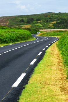 Winding road along the ocean coast in Brittany, France