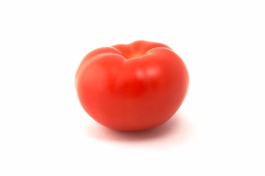 Red tomato on a white background