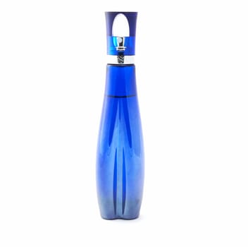 Dark blue glass bottle on a white background