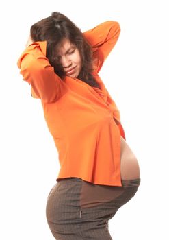 Portrait of the pregnant woman in an orange shirt