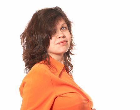 Portrait of the pregnant woman in an orange shirt