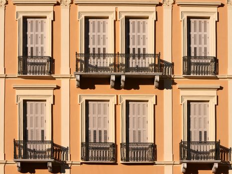 front view of noeclassical building on sunset architecture backgrounds