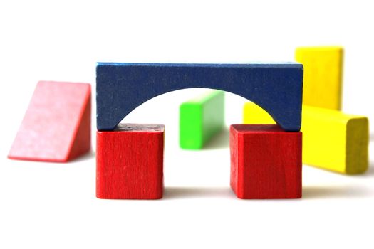 Wooden building blocks isolated on white background