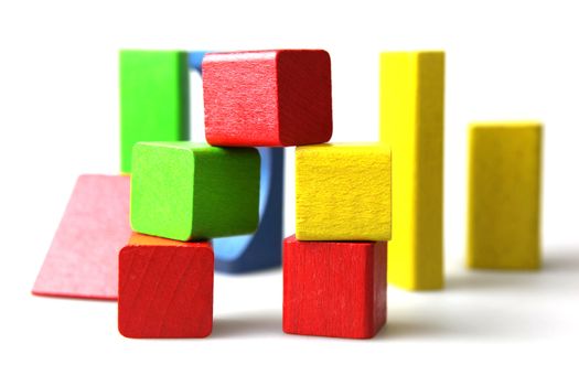Wooden building blocks isolated on white background
