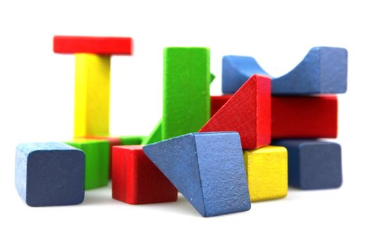 Wooden building blocks isolated on white background
