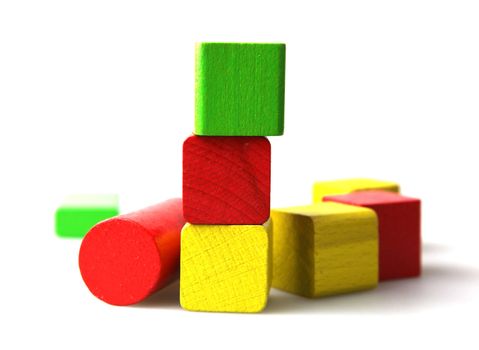 Wooden building blocks isolated on white background