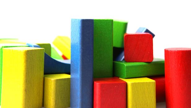 Wooden building blocks isolated on white background