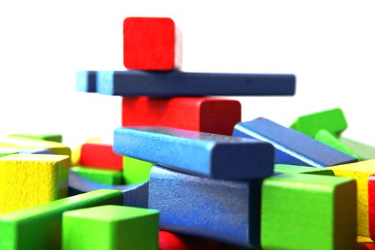 Wooden building blocks isolated on white background