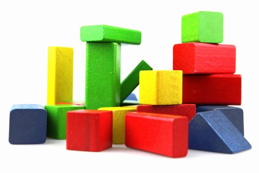 Wooden building blocks isolated on white background