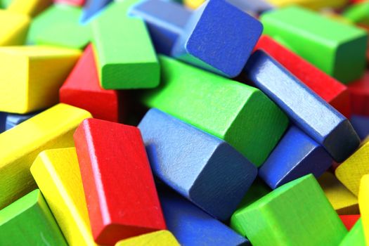 Wooden building blocks isolated on white background