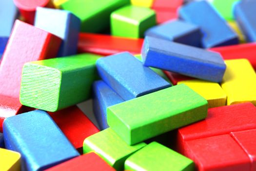 Wooden building blocks isolated on white background