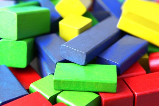 Wooden building blocks isolated on white background