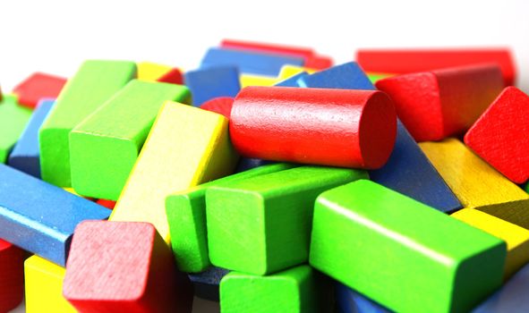 Wooden building blocks isolated on white background