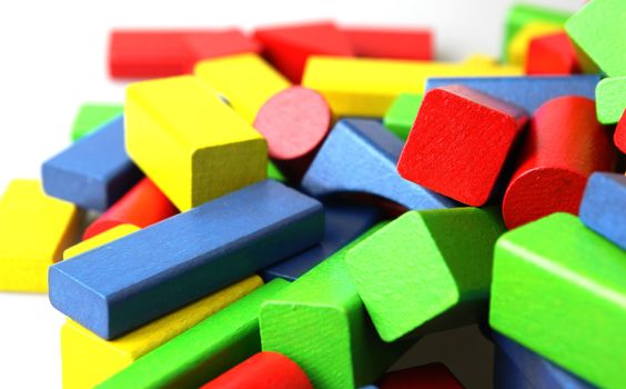 Wooden building blocks isolated on white background