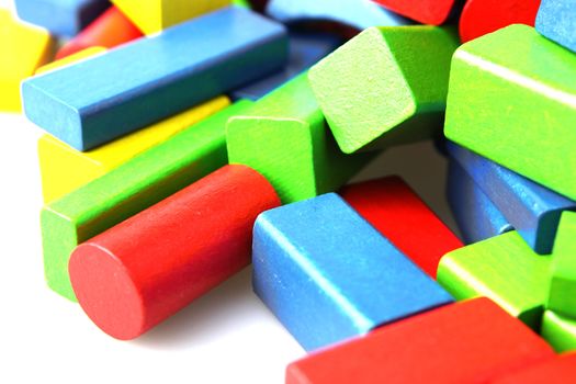 Wooden building blocks isolated on white background