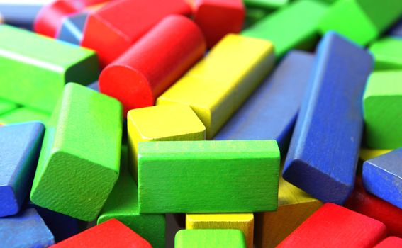 Wooden building blocks isolated on white background
