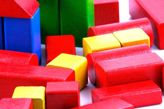 Wooden building blocks isolated on white background