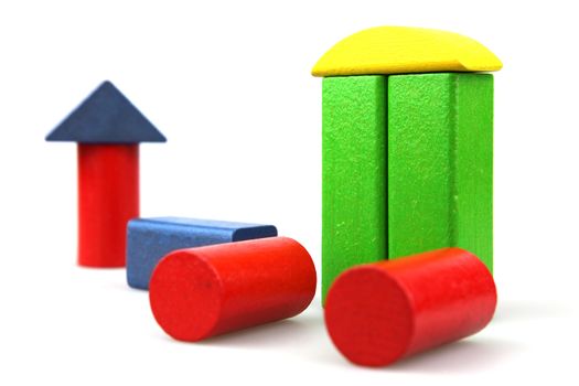 Wooden building blocks isolated on white background