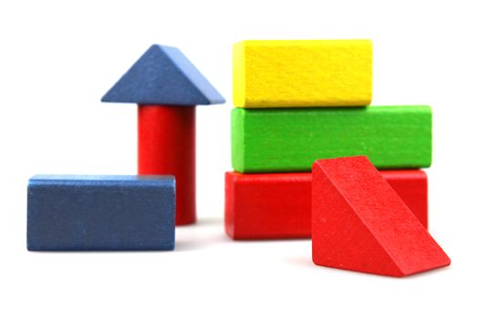 Wooden building blocks isolated on white background