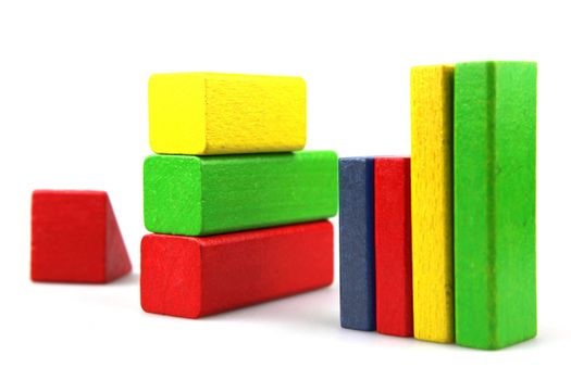 Wooden building blocks isolated on white background