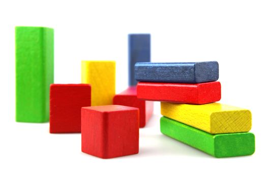 Wooden building blocks isolated on white background
