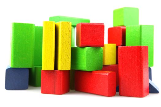 Wooden building blocks isolated on white background