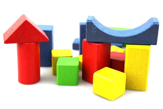 Wooden building blocks isolated on white background