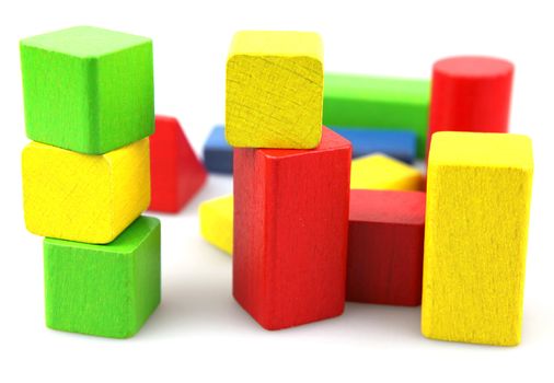 Wooden building blocks isolated on white background