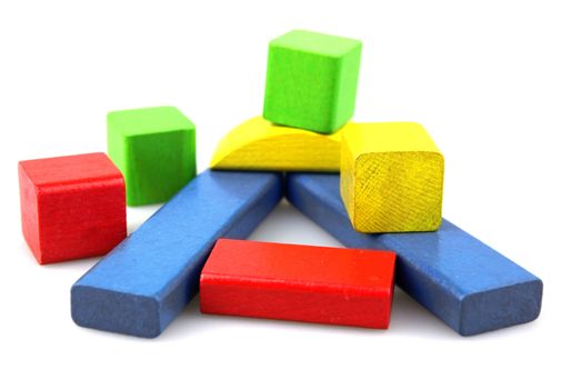 Wooden building blocks isolated on white background