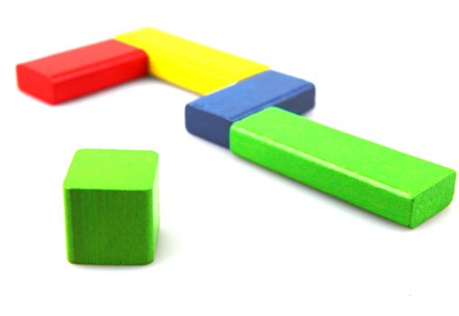 Wooden building blocks isolated on white background
