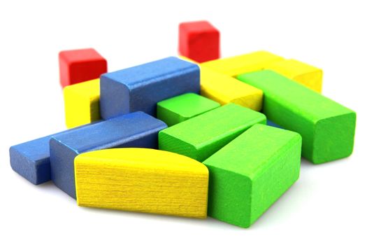 Wooden building blocks isolated on white background