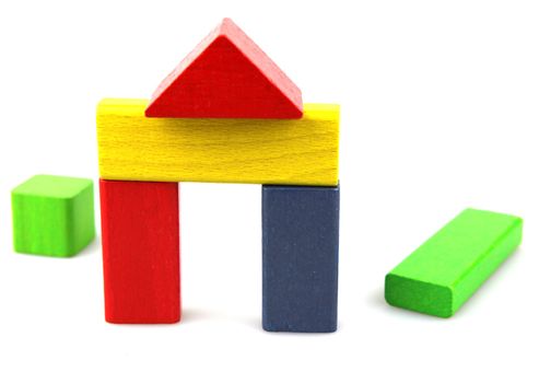 Wooden building blocks isolated on white background
