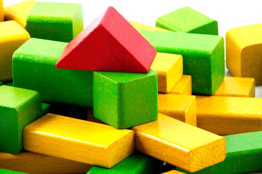 Wooden building blocks isolated on white background