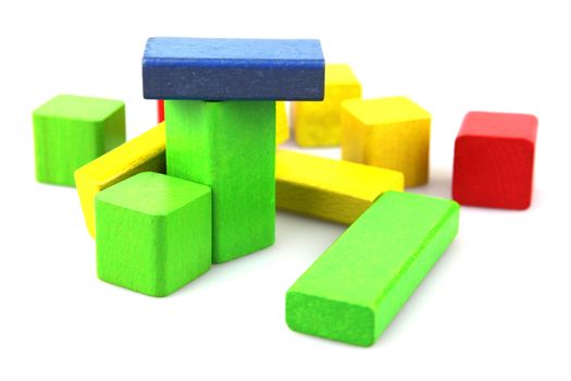 Wooden building blocks isolated on white background