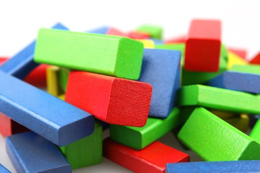 Wooden building blocks isolated on white background
