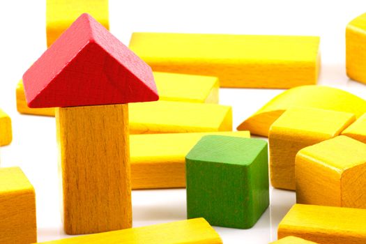 Wooden building blocks isolated on white background