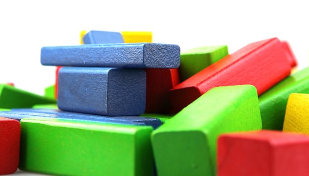 Wooden building blocks isolated on white background